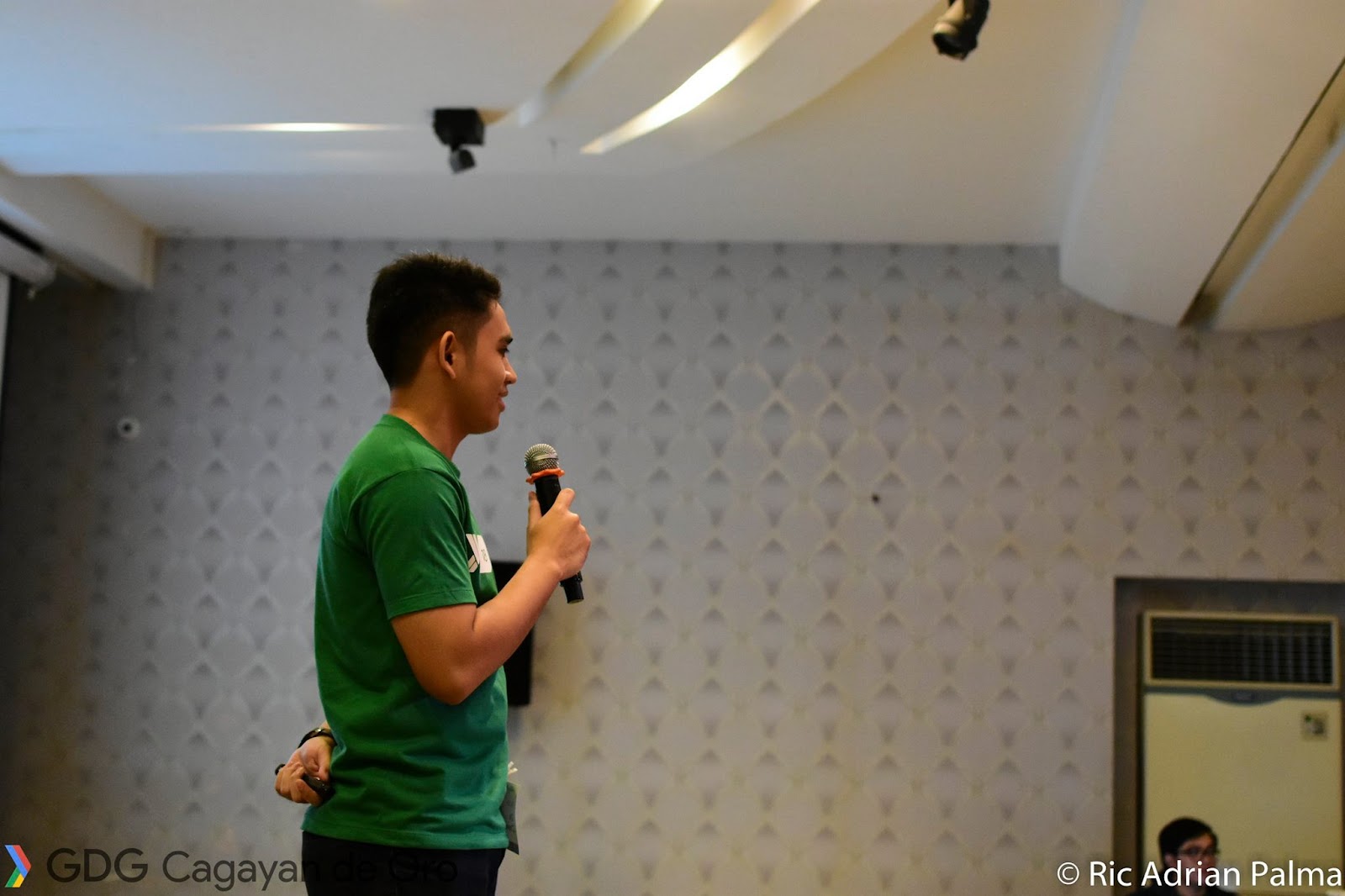Dylan speaking at a conference